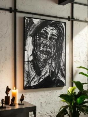 Big expressive black and white abstract drawing portrait of an intense dark woman face with ink strokes on paper